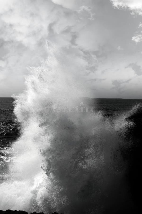 Giant wave crashing on burren cliffs