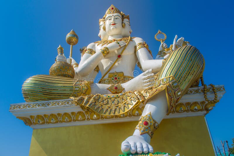 Giant White Brahma Statue with Blue Sky Background. Brahma is the Hindu ...