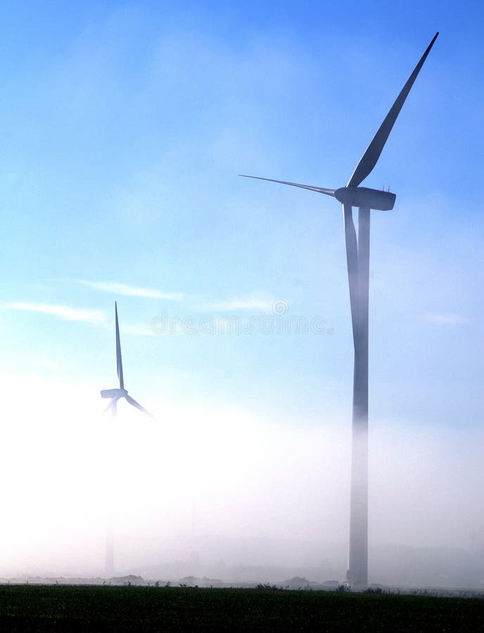 Giant wind turbines in the fog