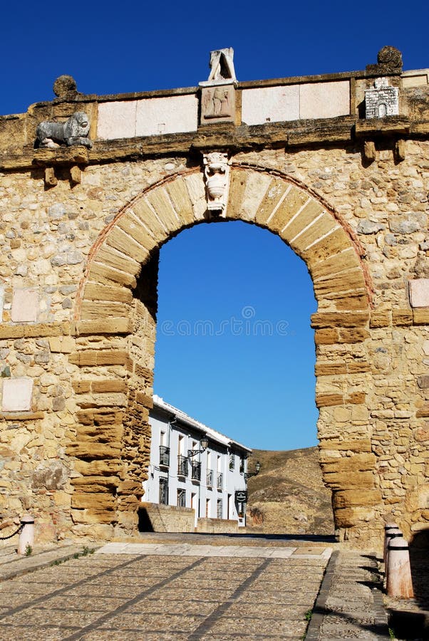 Statue of Pedro Espinosa in the Plaza de Santa Maria with a pavement cafe  and the giants arch to the rear, Antequera, Spain Stock Photo - Alamy