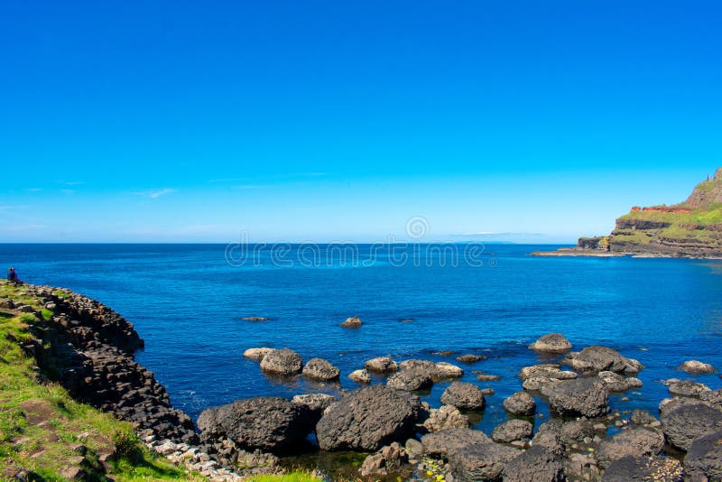 Giants Causeway on Coast of Atlantic Ocean in Northern Ireland. Beautiful landscape, summer time stock images Giants Causeway on Coast of Atlantic Ocean in Northern Ireland. Beautiful landscape, summer time stock images