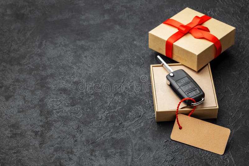 Gift Box with Car Keys with Remote Control Alarm System with Red Ribbon