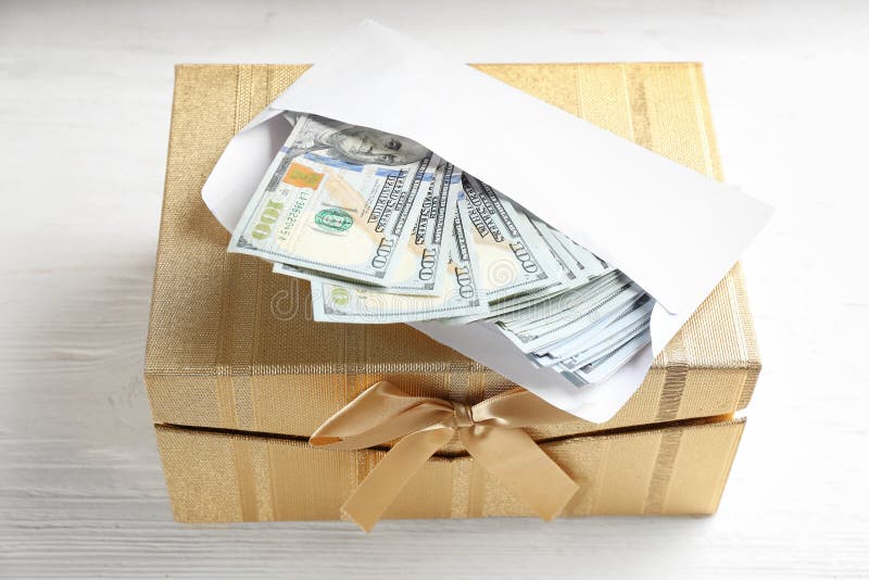 Gift box with dollar bills stock photo. Image of bank 169285910