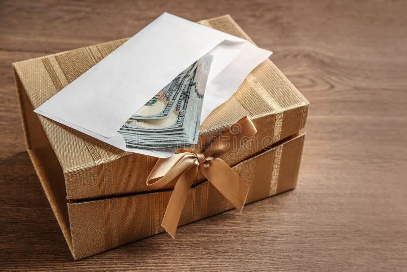 Gift box with dollar bills stock photo. Image of bank 169285910
