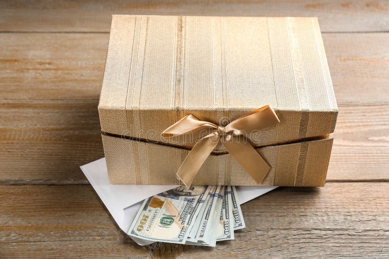 Gift box with dollar bills stock photo. Image of bank 169285910