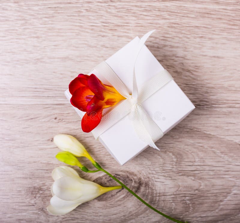 Gift box with flowers stock image. Image of holiday 113656273