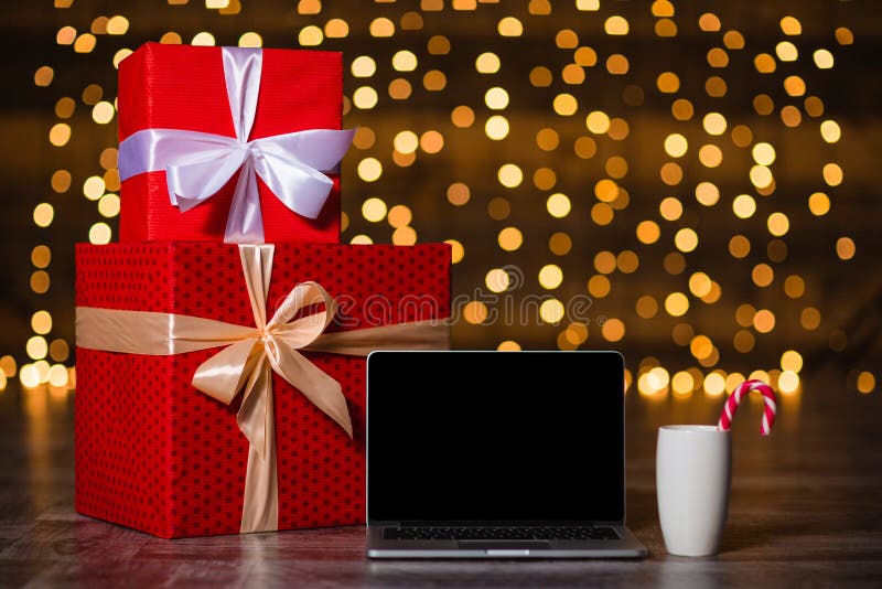 Gift Box and Laptop Computer Standing on the Floor Stock Image Image