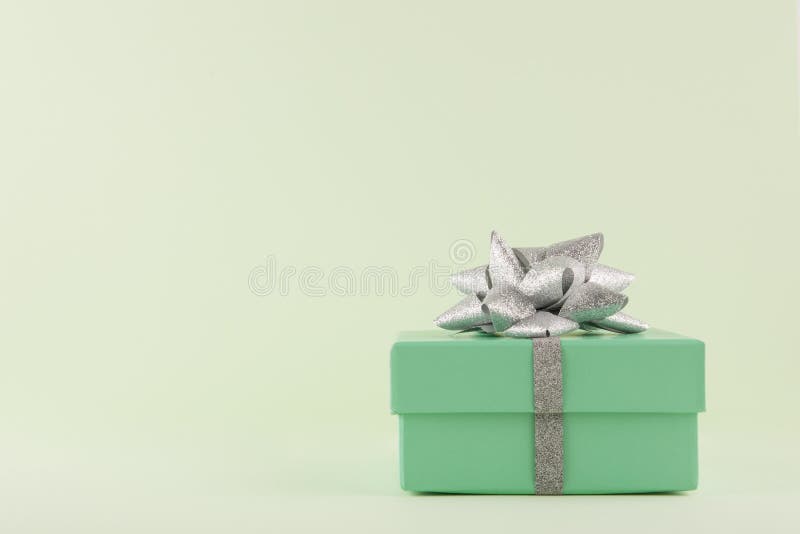 Gift Box, Pastel Green Gift Box with Silver Ribbon and Bow on Light