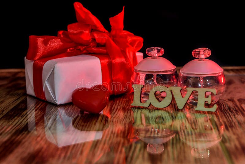 Gift Box and Perfumes As Valentine Presents on Dark Stock Photo - Image of  fragrance, bottle: 166509000