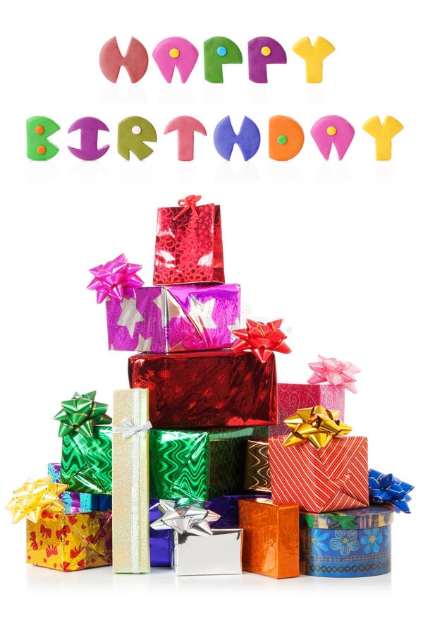 Gift boxes. Happy birthday # 3.2 | Isolated. Stack of colorful gift boxes with real reflection and plasticine words 'Happy birthday'. isolated over white royalty free stock image Gift boxes. Happy birthday # 3.2 | Isolated. Stack of colorful gift boxes with real reflection and plasticine words 'Happy birthday'. isolated over white royalty free stock image