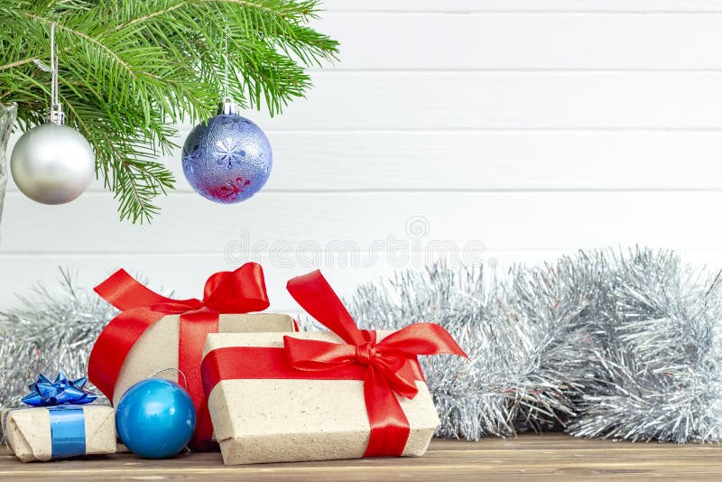 Gift Boxes Under Christmas Tree. Christmas Background Stock Photo