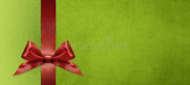 Gift card wishes merry christmas background with red ribbon bow on green shiny vibrant color texture template with blank copy. Space royalty free stock images Gift card wishes merry christmas background with red ribbon bow on green shiny vibrant color texture template with blank copy. Space royalty free stock images