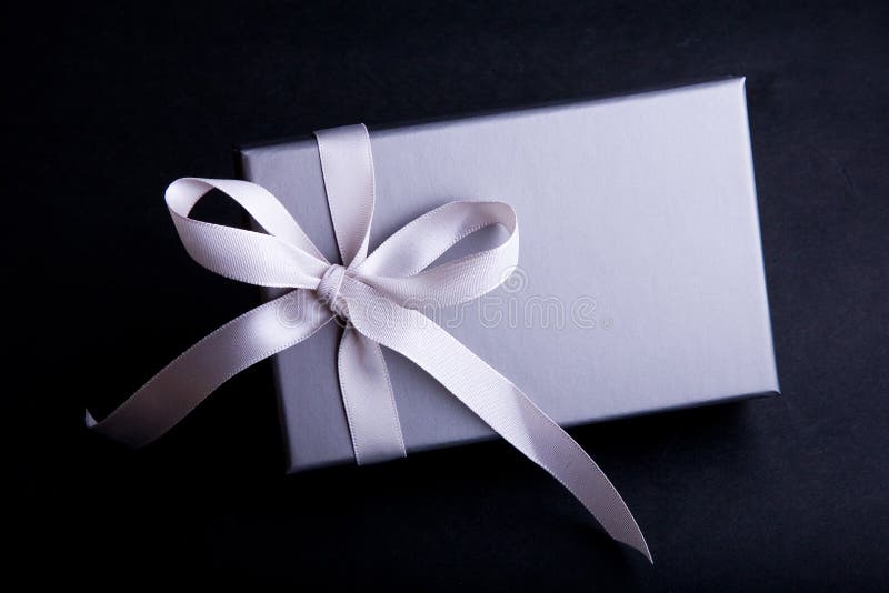 Gift With A Satin Ribbon royalty free stock image