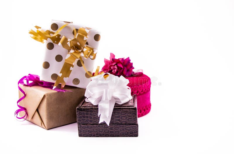 Gifts for all occasions concept. Set of colorful gift boxes with bows and ribbons on white surface