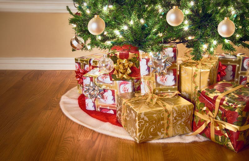 Gifts under Christmas tree stock photo. Image of shiny