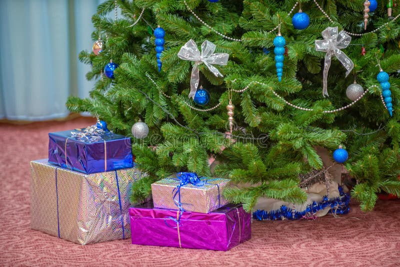 Gifts under christmas tree stock photo. Image of decor 47045318