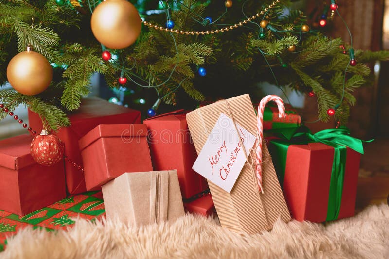 Gifts under Christmas tree stock image. Image of year 62131091
