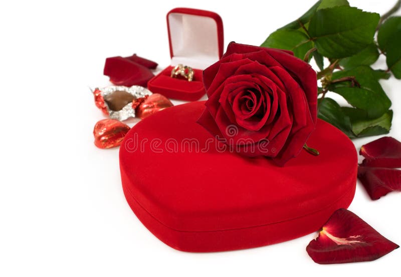 Gifts for Valentine's Day: flowers, chocolates , jewelry isolated on white