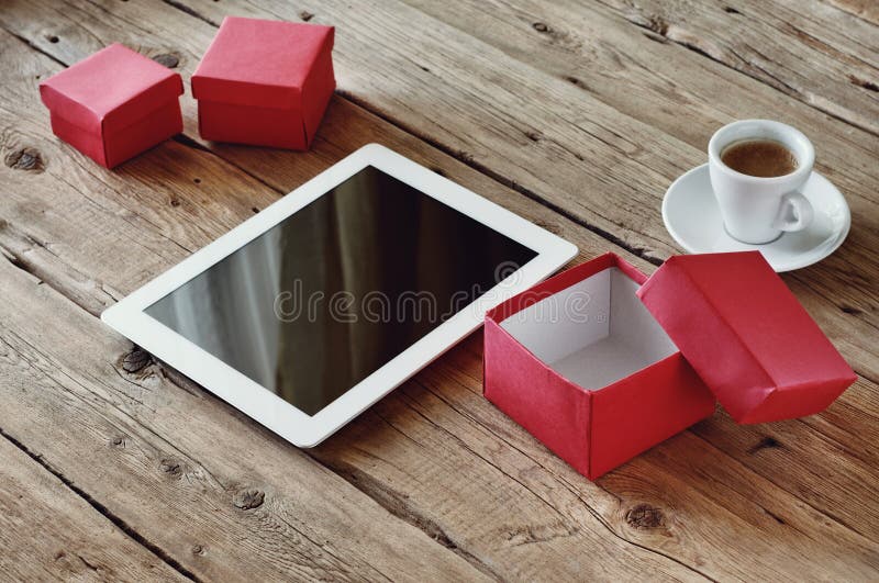 Gifts with a White Tablet Computer Stock Photo Image of holiday