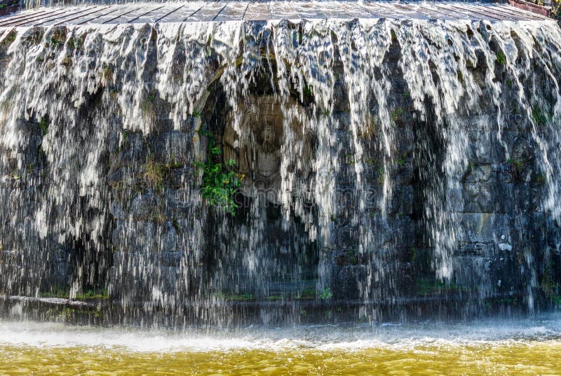 Gigantic water cascades during water features in the Wilhelmshoehe mountain park in Kassel, Germany stock photos Gigantic water cascades during water features in the Wilhelmshoehe mountain park in Kassel, Germany stock photos