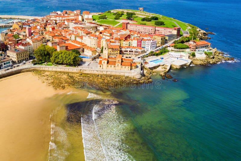 Gijon beach aerial view in the centre of Gijon city in Asturias, Spain. Gijon beach aerial view in the centre of Gijon city in Asturias, Spain