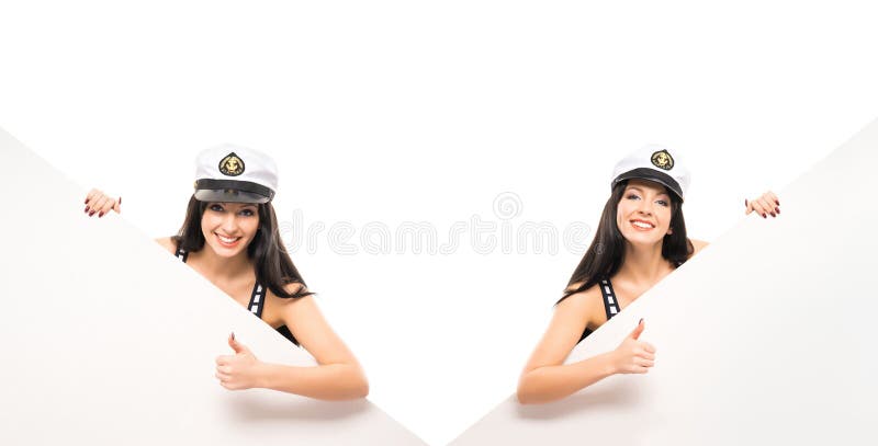 Gils bonitos e 'sexy' do marinheiro que guardam bandeiras fotos de stock royalty free Gils bonitos e 'sexy' do marinheiro que guardam bandeiras fotos de stock royalty free