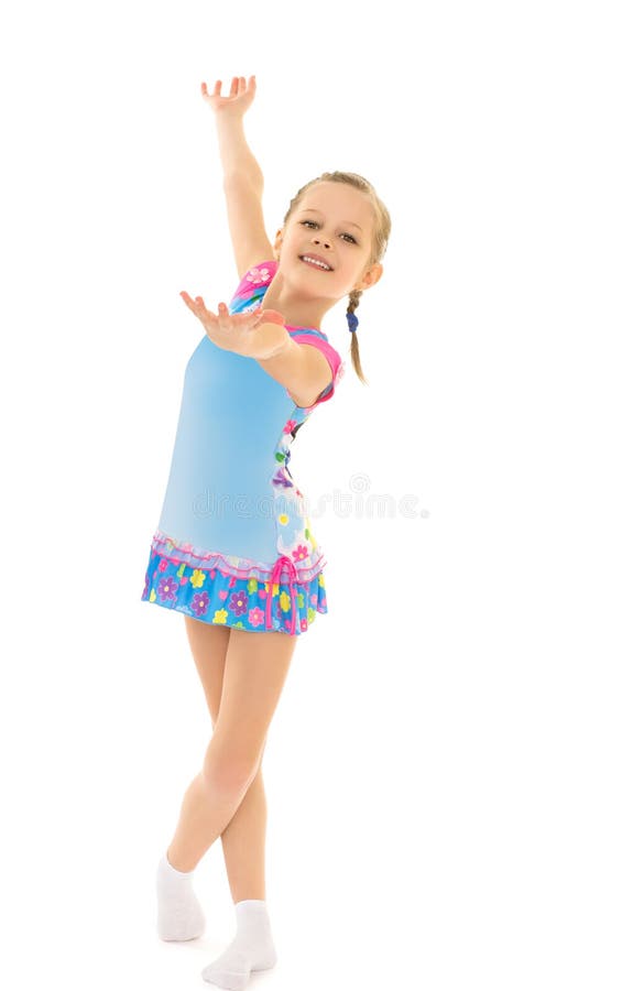 Gimnasta en vestido corto foto de archivo. Imagen de traje - 63497144 Gimnasta en vestido corto foto de archivo. Imagen de traje - 63497144