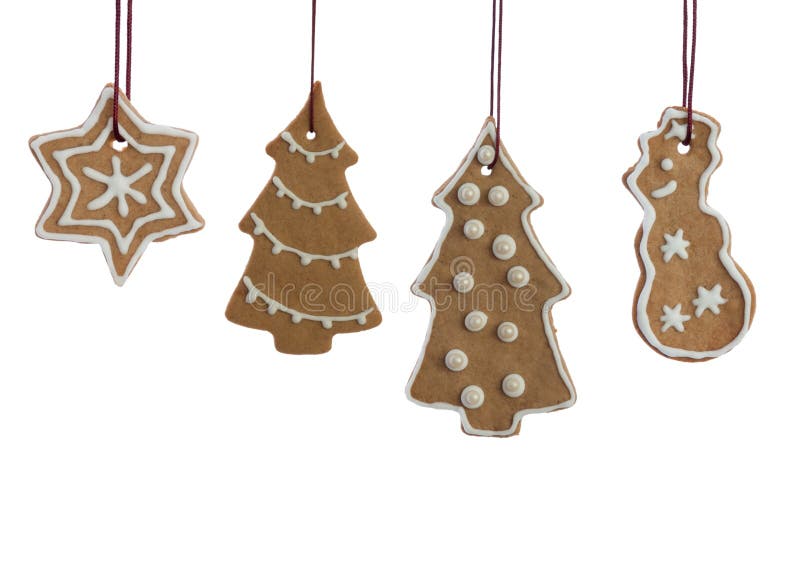 Ginger Bread Christmas Cookies adornado colgante en blanco foto de archivo Ginger Bread Christmas Cookies adornado colgante en blanco foto de archivo