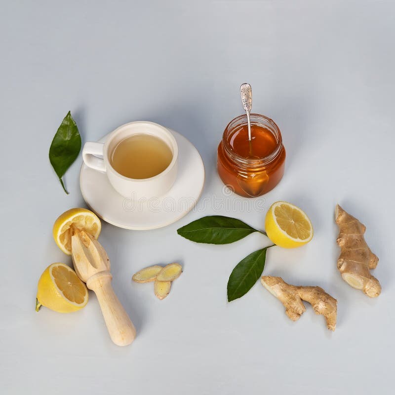 Ginger, Honey and Lemon Herbal Tea on Light Grey Background Stock Image