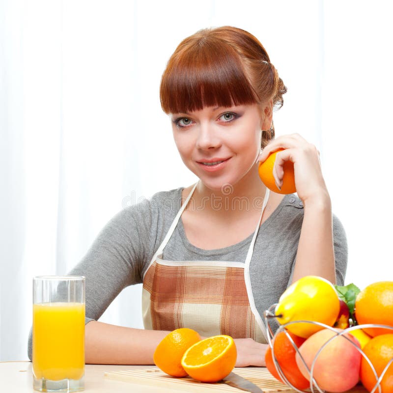 Ginger woman at kitchen