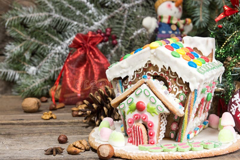 Gingerbread house. Christmas holiday sweets. European Christmas. Tree, copy.