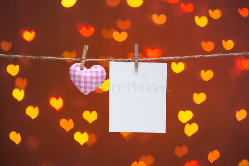 Gingham Love Valentines hearts natural cord and wooden clips hanging on the clothesline heart bokeh sparkle background