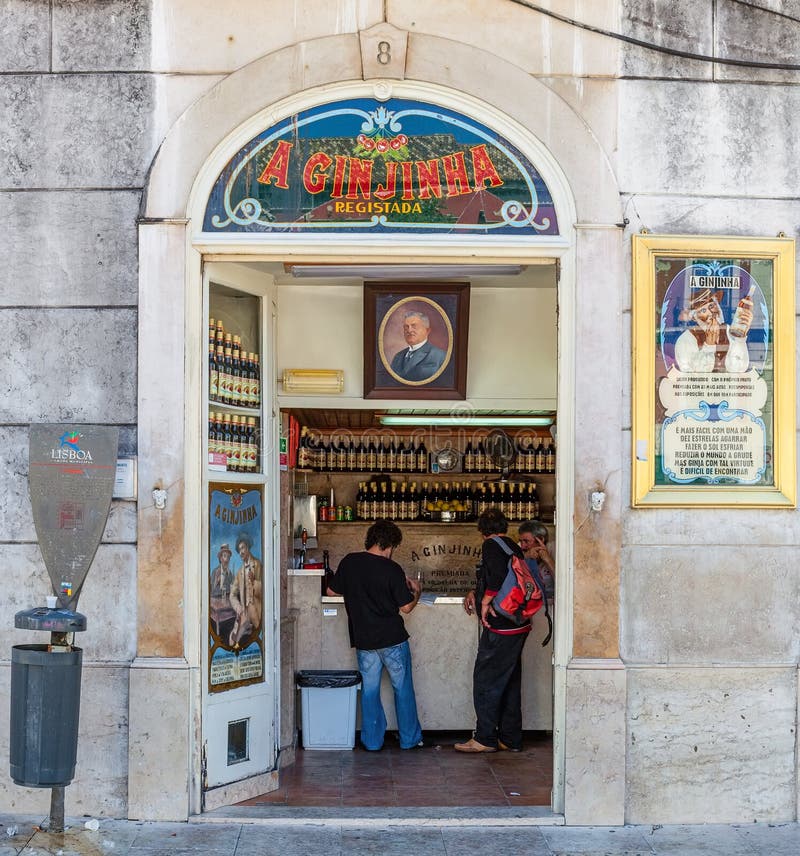 Lisbon, Portugal. August 31, 2014: A Ginjinha, the oldest and most famous establishment in Lisbon dedicated to sell Ginginha, a type of Sour Cherry Brandy typical of the city. Lisbon, Portugal. August 31, 2014: A Ginjinha, the oldest and most famous establishment in Lisbon dedicated to sell Ginginha, a type of Sour Cherry Brandy typical of the city