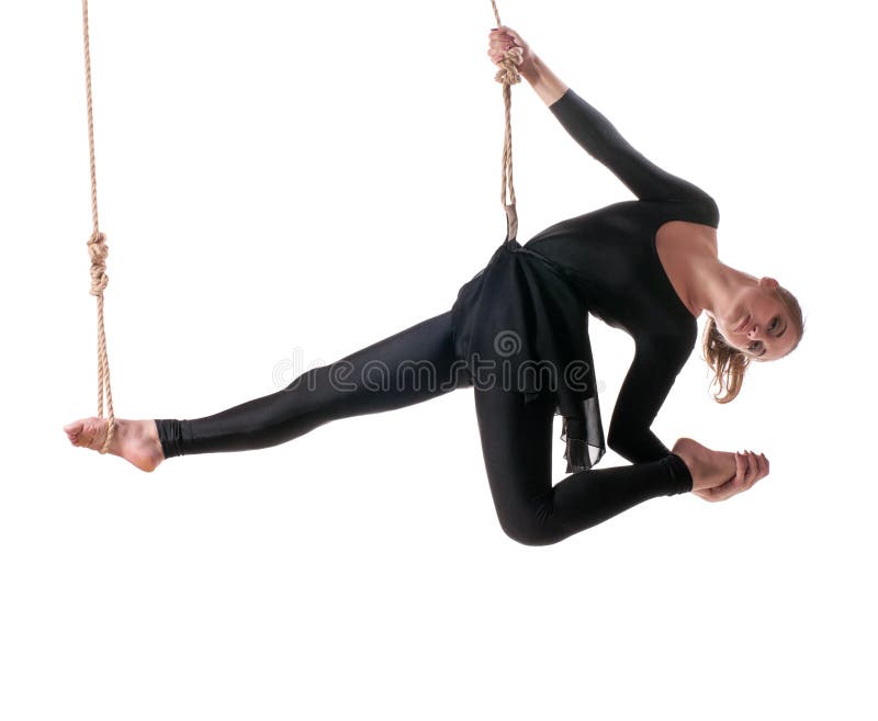 Ginnasta della giovane donna sulla corda immagini stock Ginnasta della giovane donna sulla corda immagini stock