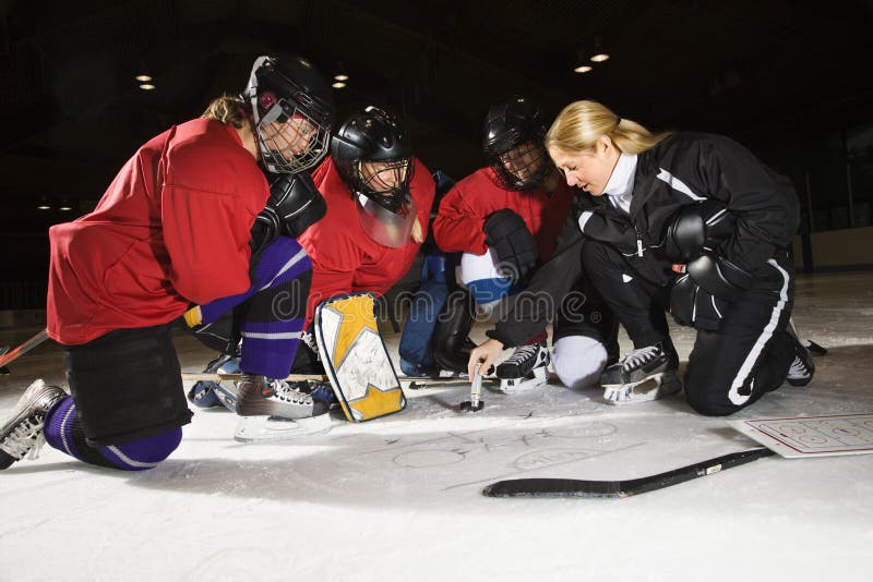 Giocatori di hokey delle donne. immagini stock libere da diritti Giocatori di hokey delle donne. immagini stock libere da diritti