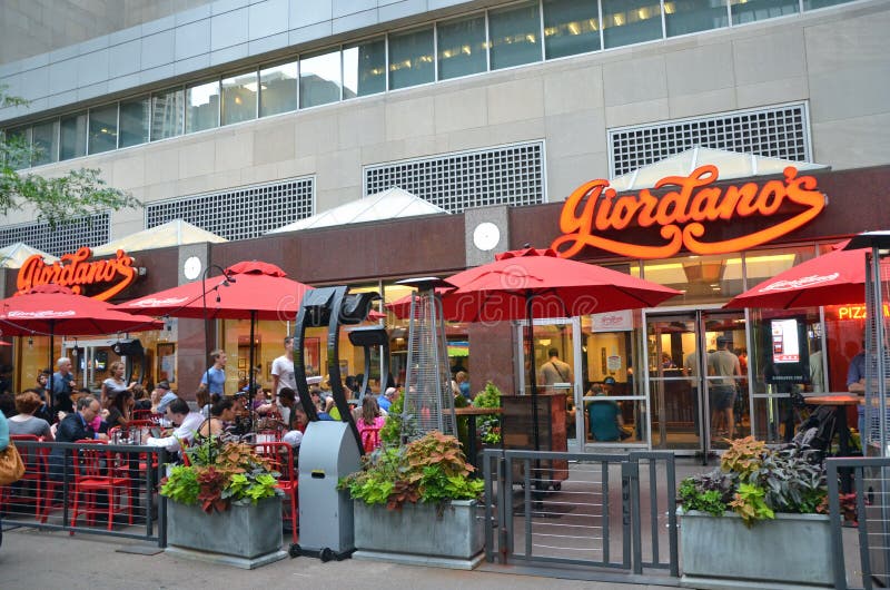 Chicago, USA - August 14, 2014: exterior of Giordano's restaurant in the Loop District, Chicago, USA. The restaurant is famous for the Chicago style deep dish pizza. Chicago, USA - August 14, 2014: exterior of Giordano's restaurant in the Loop District, Chicago, USA. The restaurant is famous for the Chicago style deep dish pizza.
