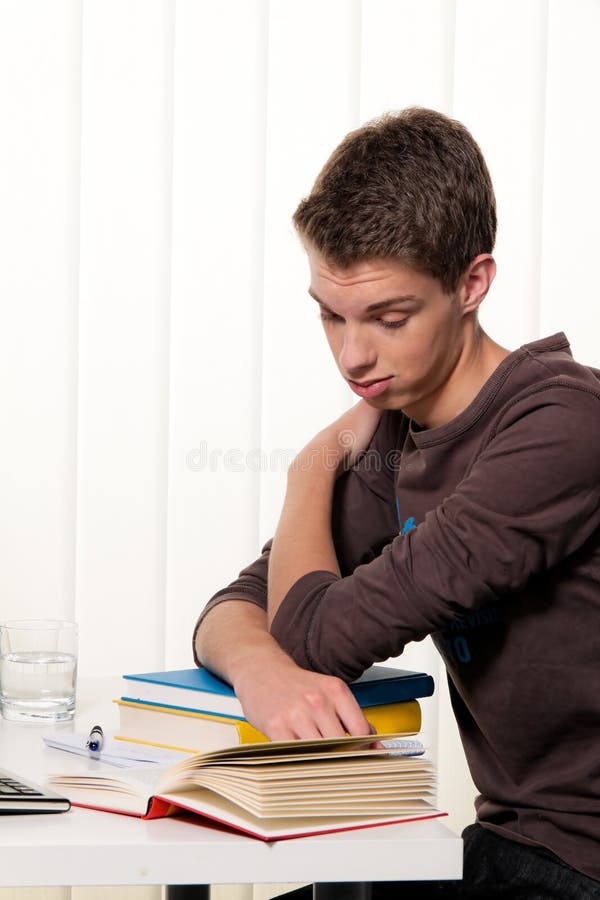 A young student in the learning with books. A young student in the learning with books