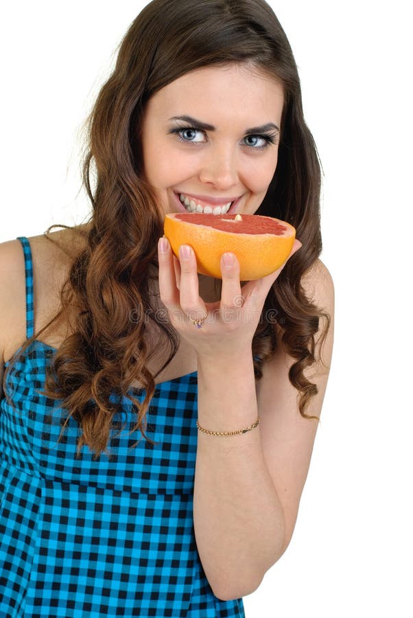 Giovane bella donna con frutta in studio fotografia stock Giovane bella donna con frutta in studio fotografia stock
