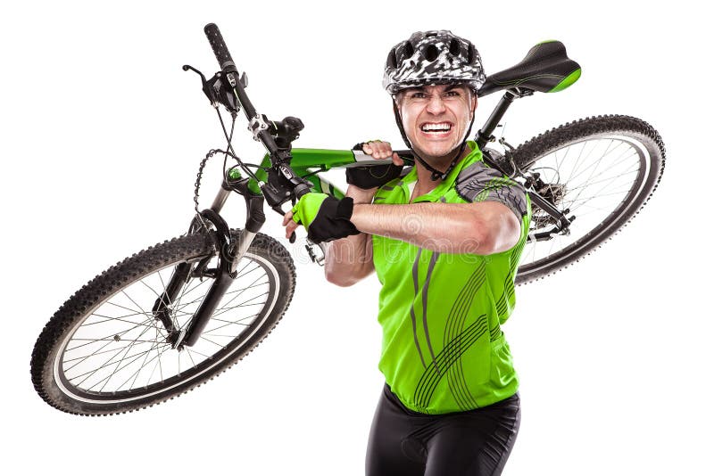 Giovane ciclista maschio con la sua bicicletta sulla corsa immagini stock libere da diritti Giovane ciclista maschio con la sua bicicletta sulla corsa immagini stock libere da diritti