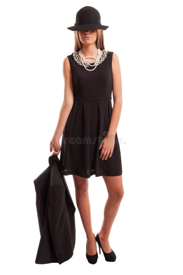 Giovane condizione della donna di affari fotografia stock Giovane condizione della donna di affari fotografia stock