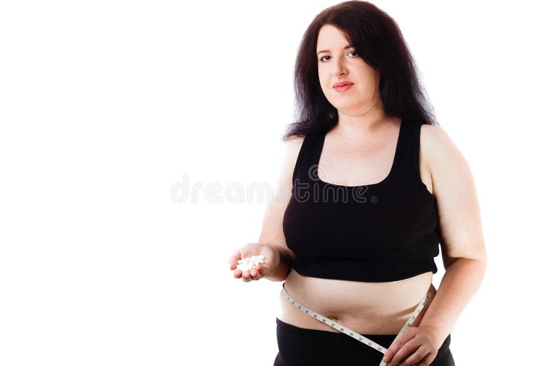 Giovane donna sorridente di peso eccessivo con nastro adesivo di misurazione intorno al suo wa fotografie stock libere da diritti Giovane donna sorridente di peso eccessivo con nastro adesivo di misurazione intorno al suo wa fotografie stock libere da diritti