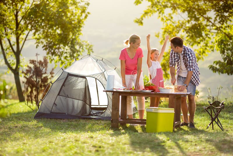 Young happy family on vacation in nature. Young happy family on vacation in nature