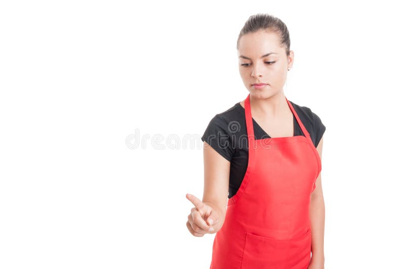 Giovane impiegato femminile del mercato che indica qualcosa giù immagine stock libera da diritti Giovane impiegato femminile del mercato che indica qualcosa giù immagine stock libera da diritti