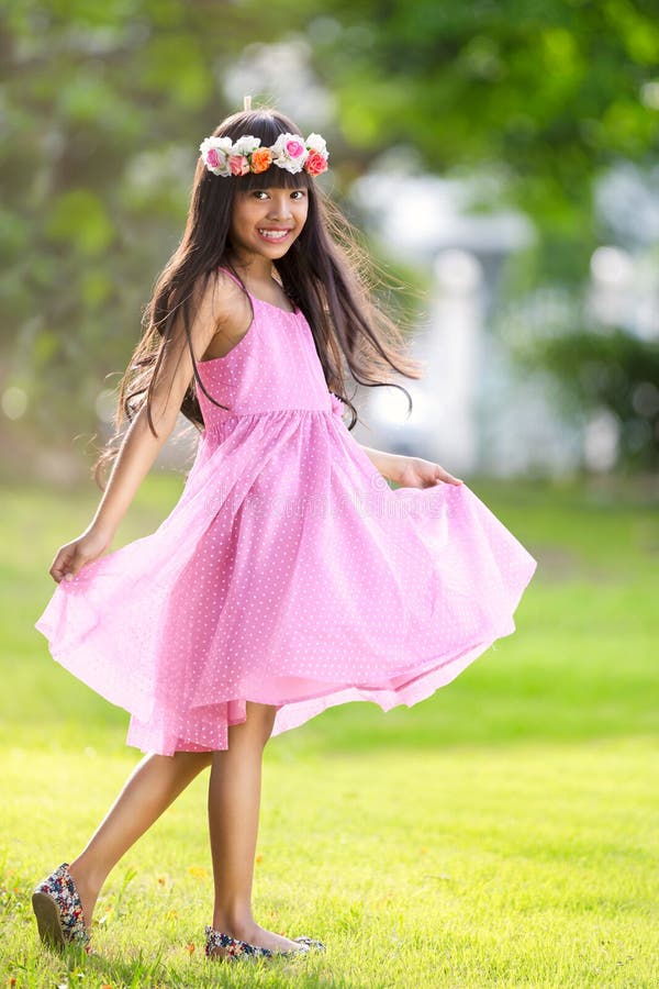 Giovane ragazza asiatica felice fotografie stock Giovane ragazza asiatica felice fotografie stock