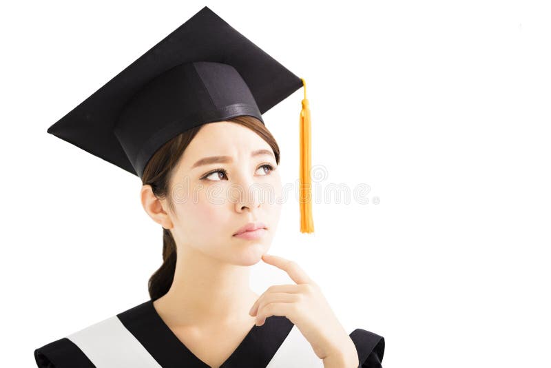 Giovane studente femminile di graduazione che cerca e che pensa fotografia stock Giovane studente femminile di graduazione che cerca e che pensa fotografia stock