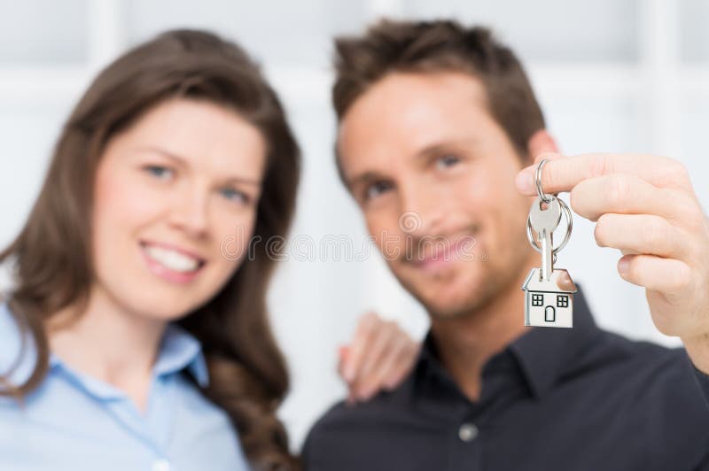 Happy Couple Owner Of New House With Keys. Happy Couple Owner Of New House With Keys