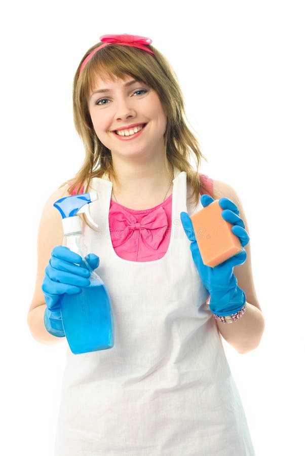 Beautiful happy young housewife with a sponge and a bottle of detergent in her hands. Beautiful happy young housewife with a sponge and a bottle of detergent in her hands