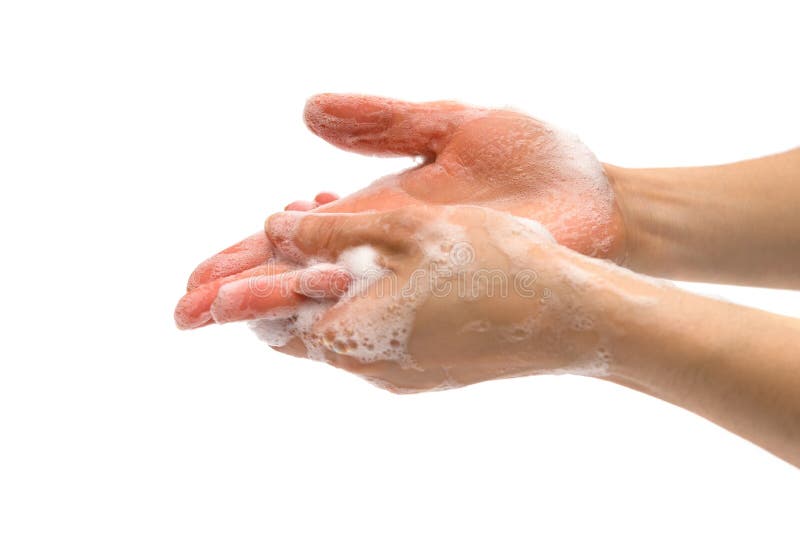 Giovani mani femminili di lavaggio con liquido insaponato