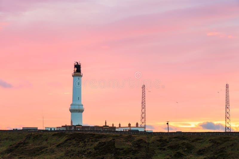 Girdle Ness lighthouse During Sunrise in Aberdeen, Scotland UK royalty free stock photo Girdle Ness lighthouse During Sunrise in Aberdeen, Scotland UK royalty free stock photo