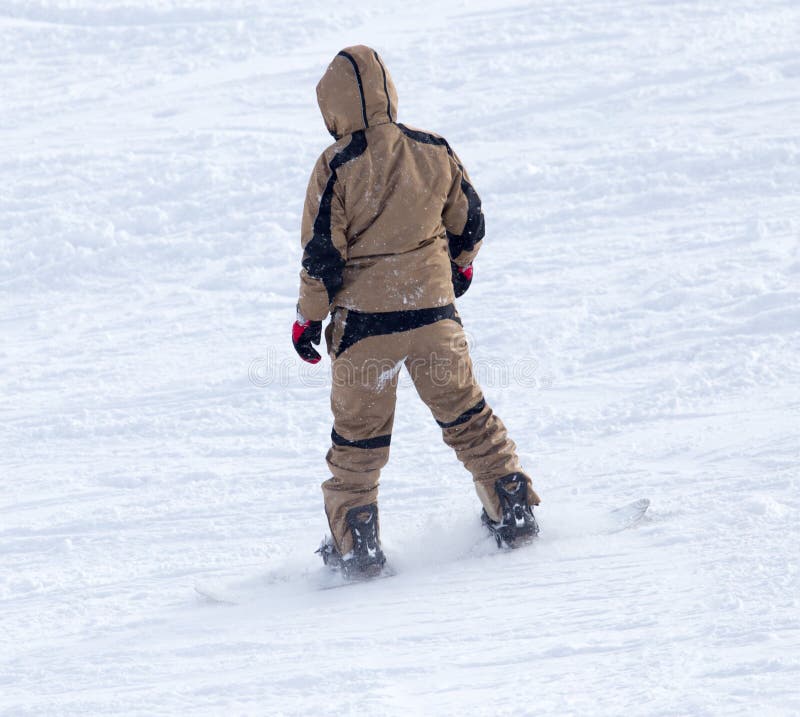 Giri dello Snowboarder fotografia stock